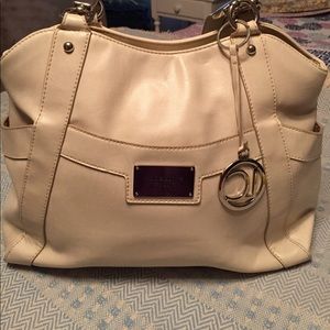 Lovely handbag! Ivory colored/silver hardware.