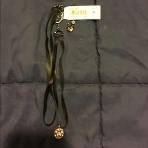 Betsey rainbow smiley face black choker