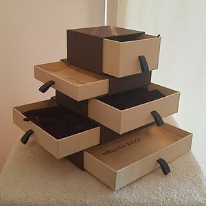 Tower of Louis vuitton boxes.