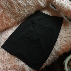 Daisy Fuentes black pencil skirt- spanx style!
