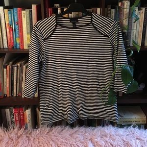 Black and white striped top with high neckline