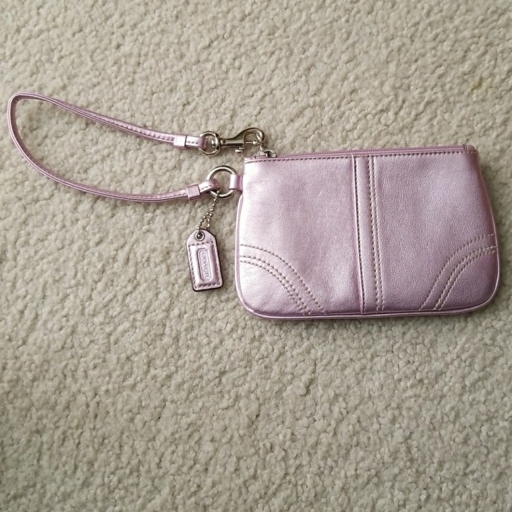 Metallic pink Coach wristlet
