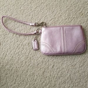 Metallic pink Coach wristlet