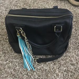 Like NEW Steve Madden purse with teal tassel