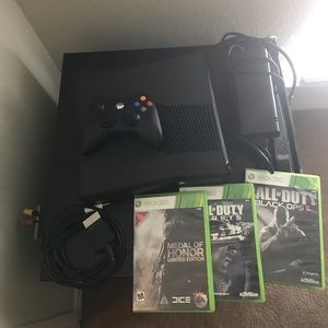Xbox 360 with three games