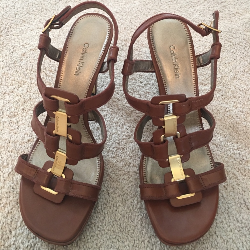 Calvin Klein t-strap leather cognac heels.