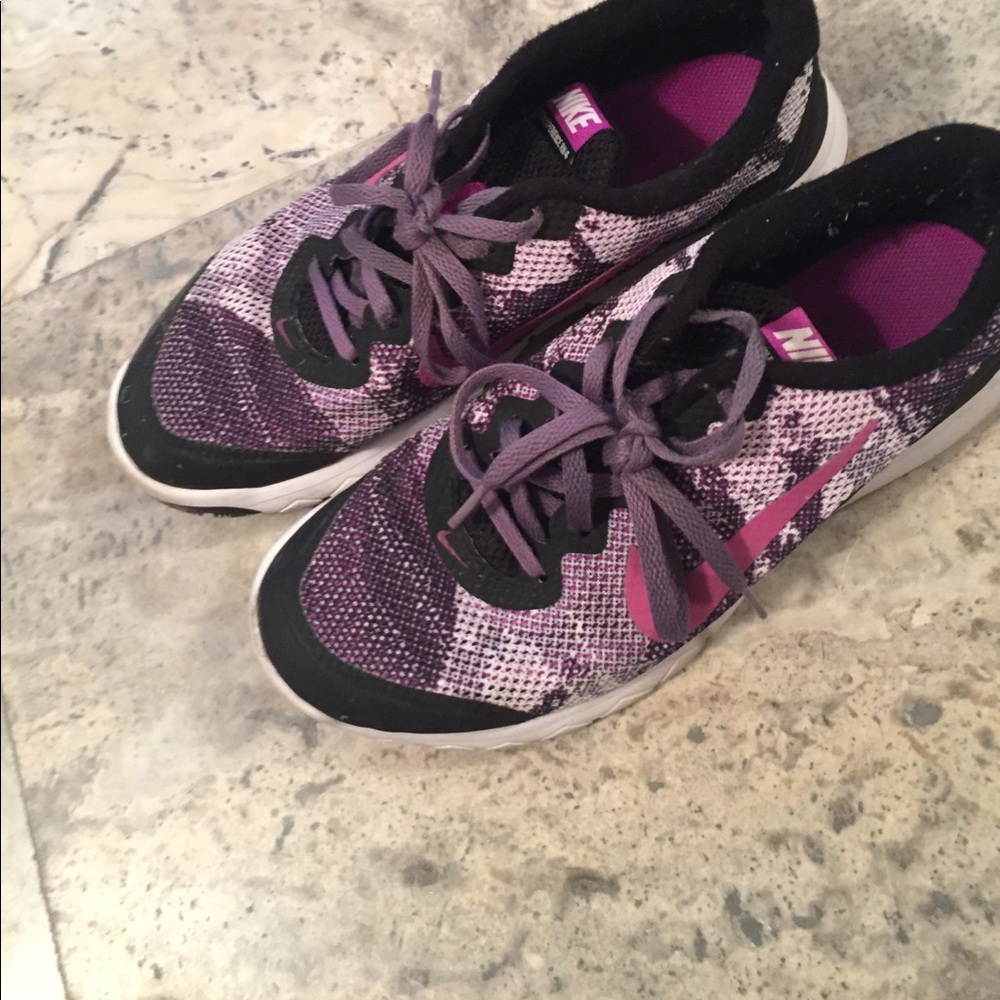 Purple Nike tennis shoes