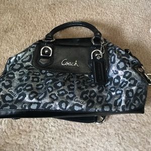 Black and silver leopard coach bag.