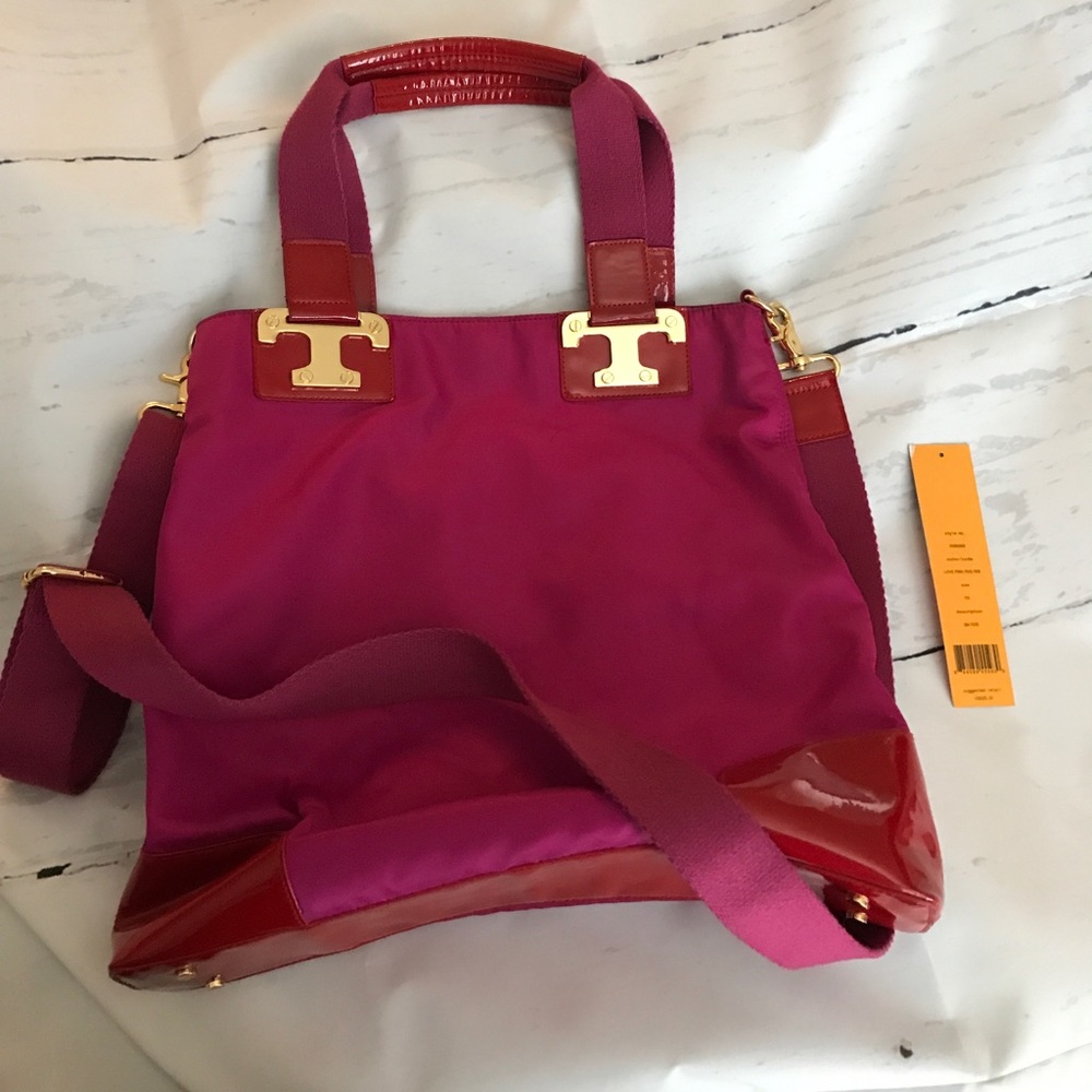 Pink and red Tory burch tote with shoulder strap