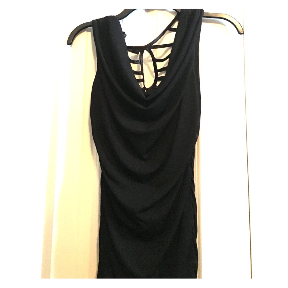 A black tight dress with a gorgeous back