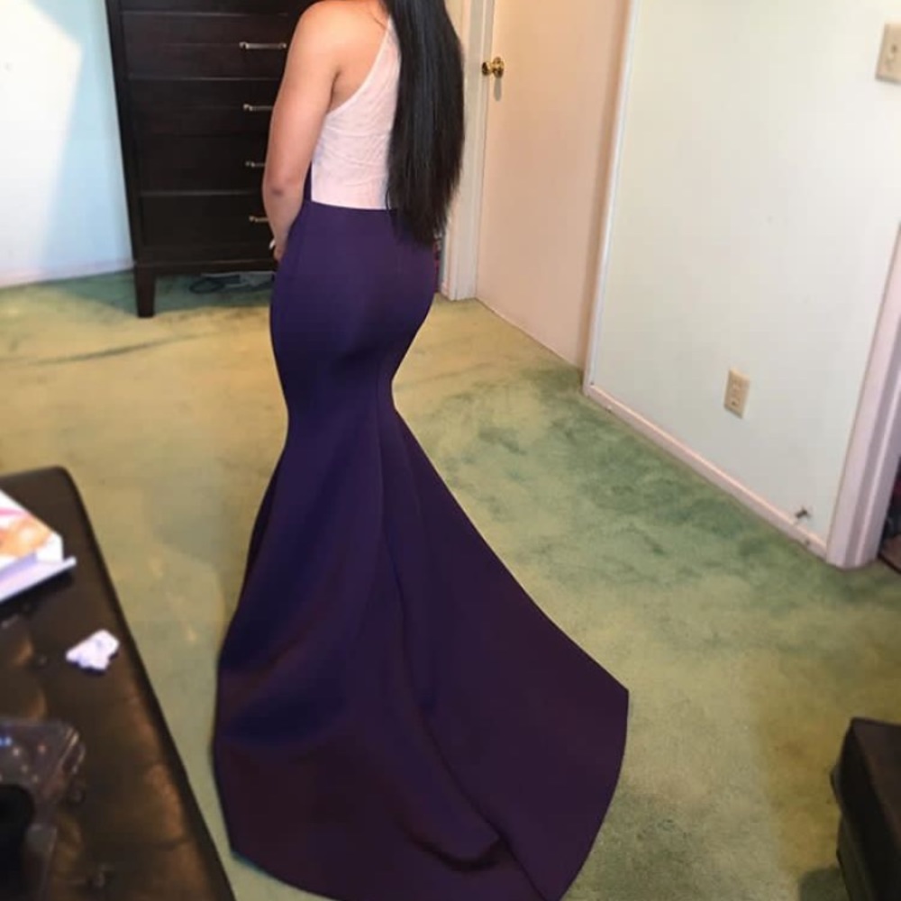 A beautiful dark purple short train prom dress