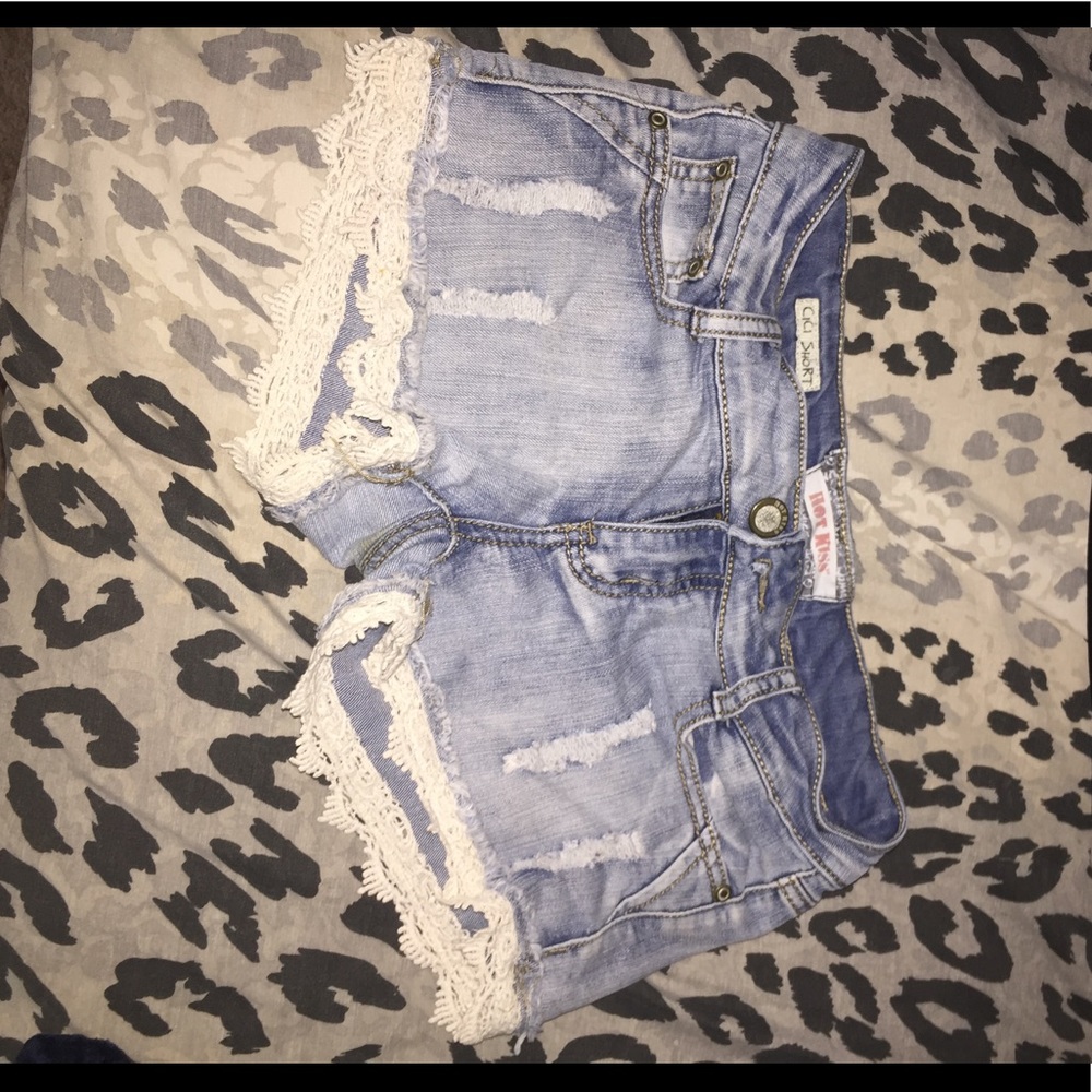 Blue shorts with white crafting.