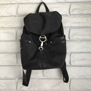 Tumi black / blue leather nylon clasp backpack