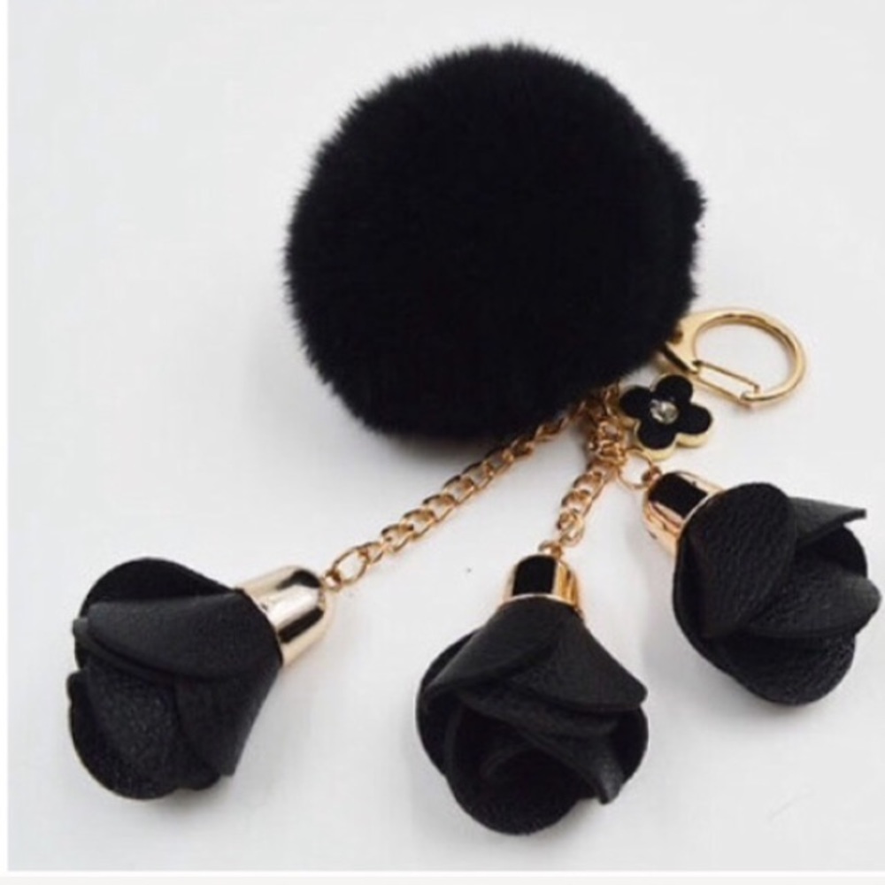Black fur pompom purse charm with roses