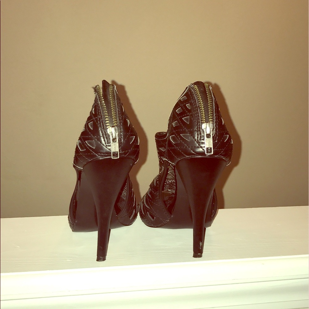 Black Carlos Santana booties