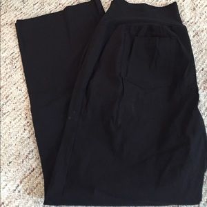 Black maternity dress plants.