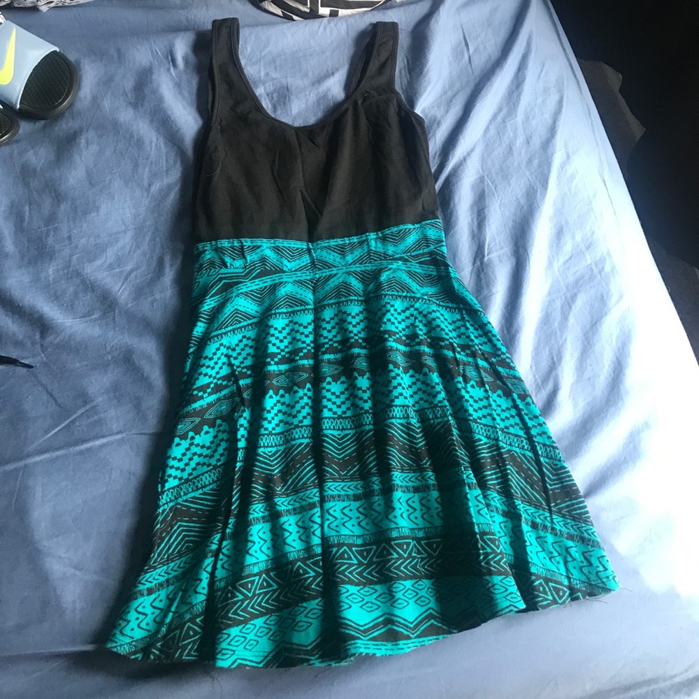 Short turquoise and black dress