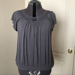 Grey maternity top with lace design