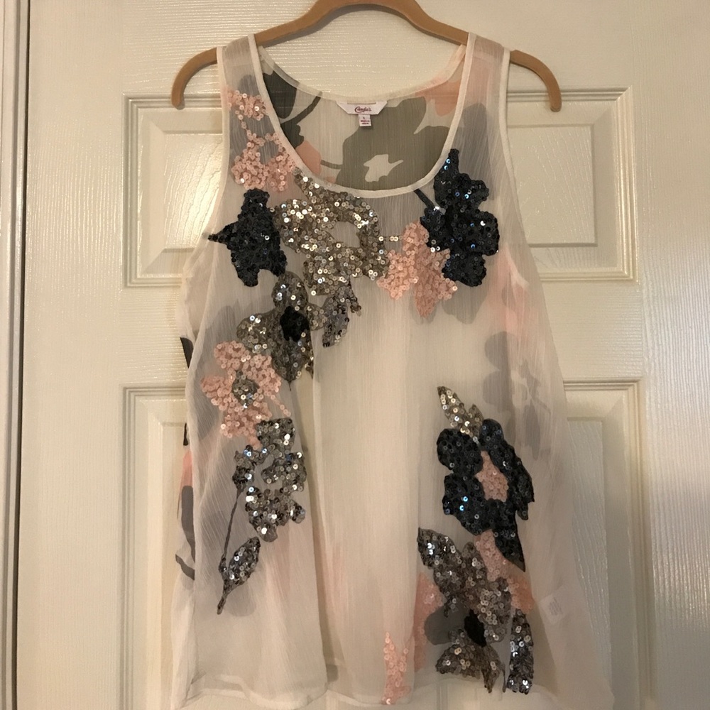 Sequined blouse.