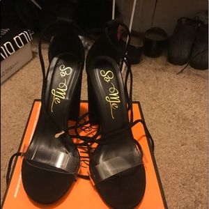 Black strap up heels