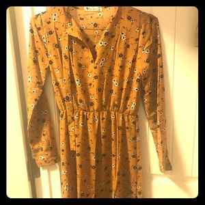 Mustard Dress size medium but fits like a small.