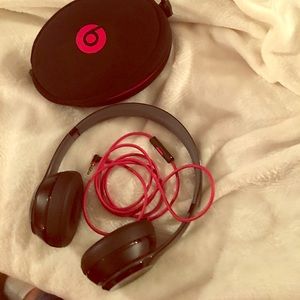 Black and red beats headphones