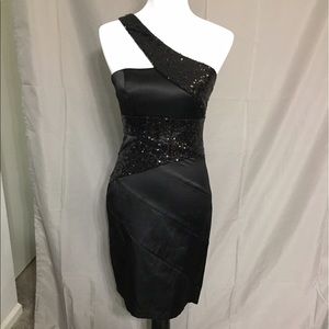 Bisou Bisou black sequin cocktail dress.