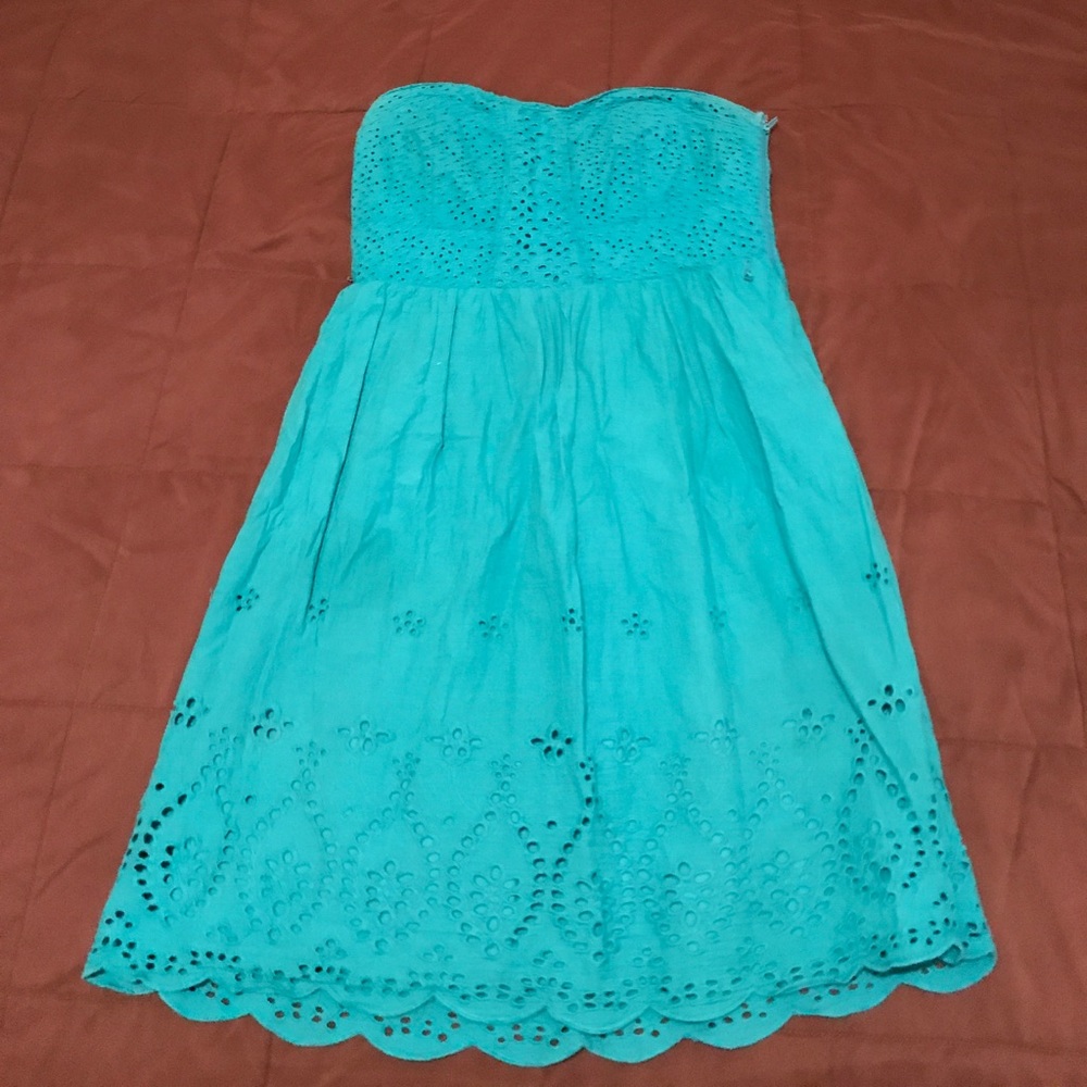 Great sun dress, light turquoise color.