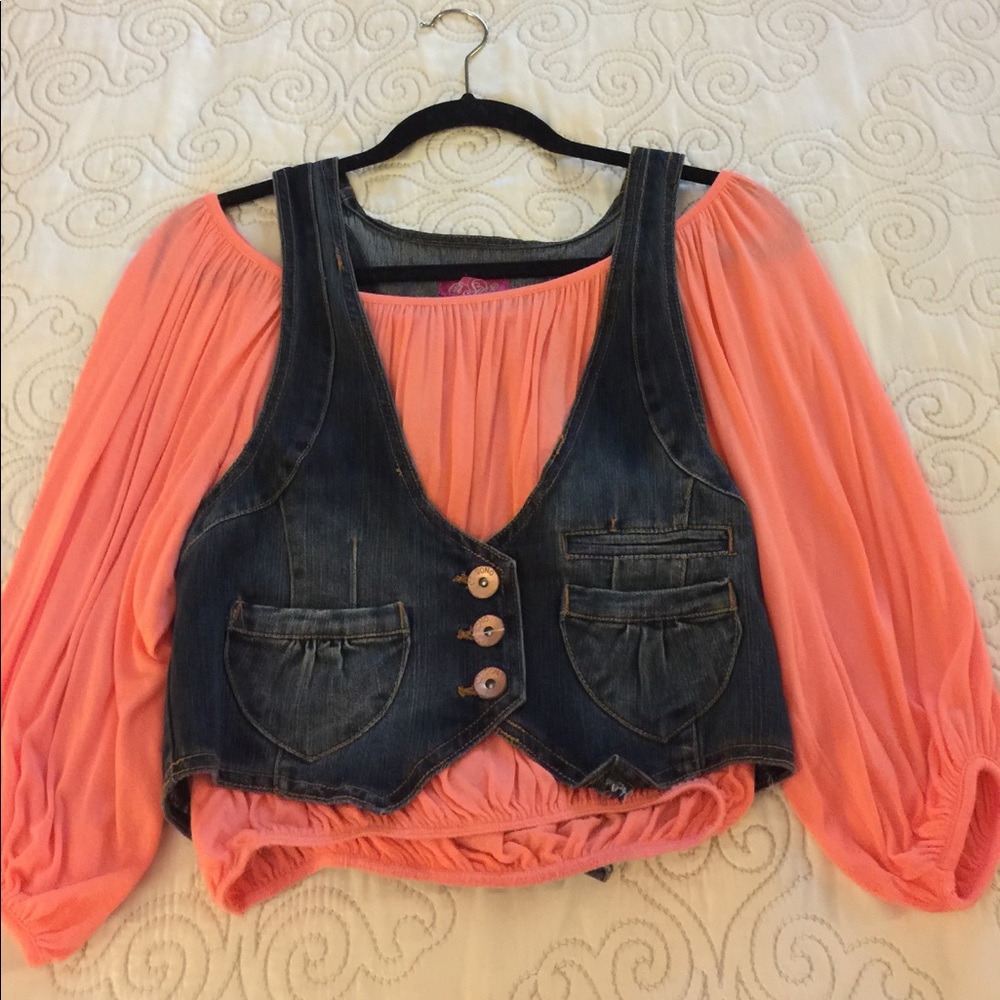 Shasa orange top with jean vest.