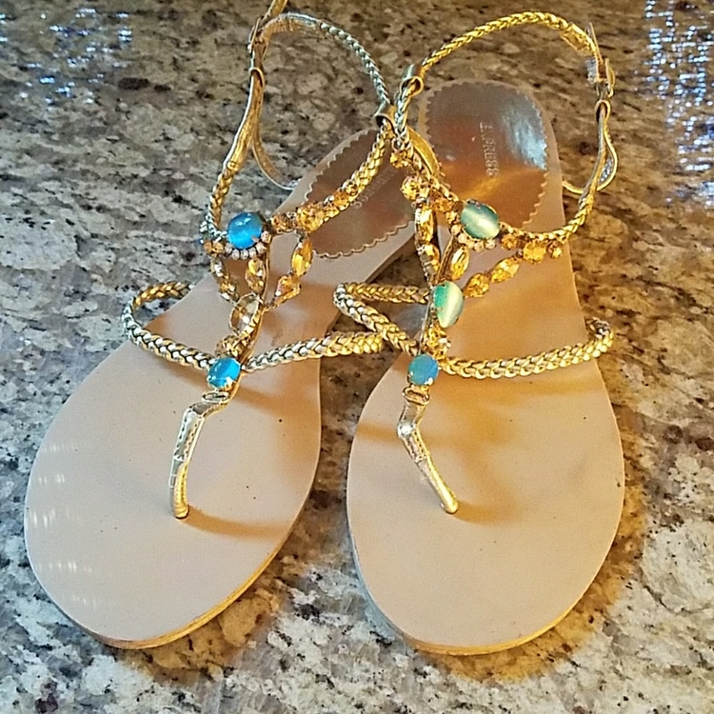 Gold and blue slightly used Express sandles.