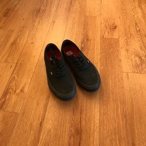 Vans black slip on size 8 men's.