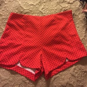 Red high waisted shorts with blue polka dots
