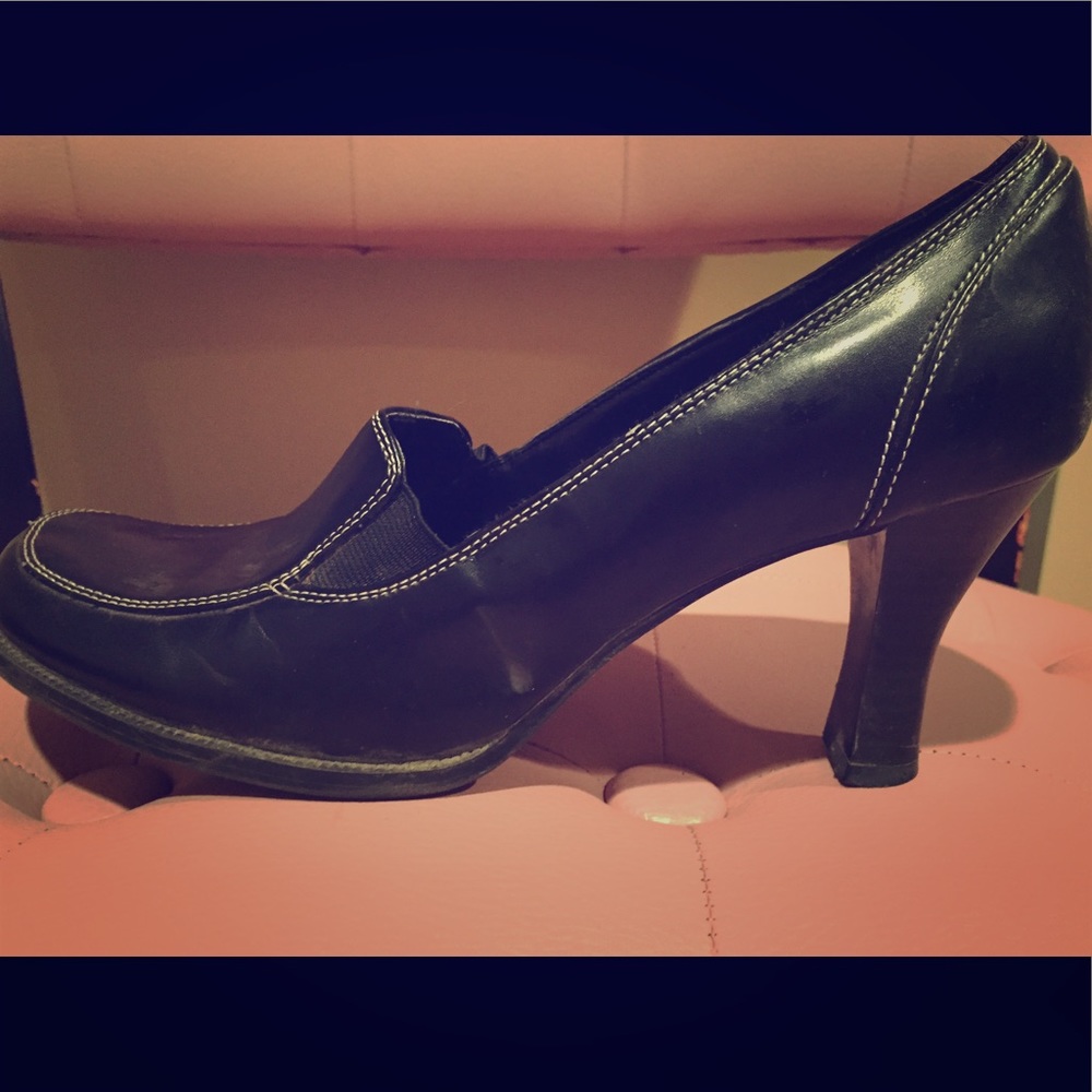 Size 9 black heels with white seams.