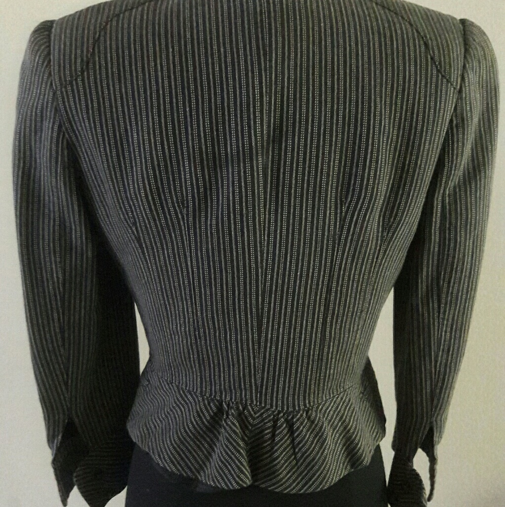 A stylish  black and tan jacket. - Picture 2 of 3