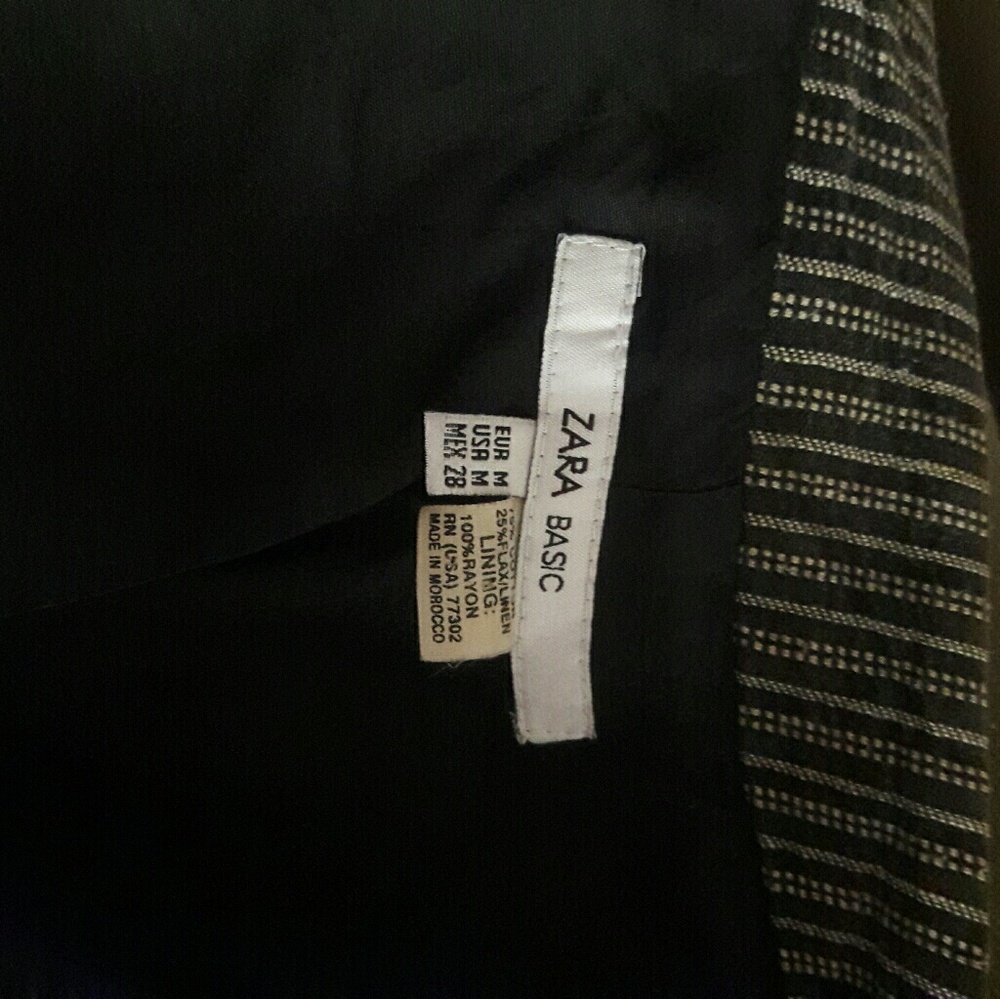 A stylish  black and tan jacket. - Picture 3 of 3