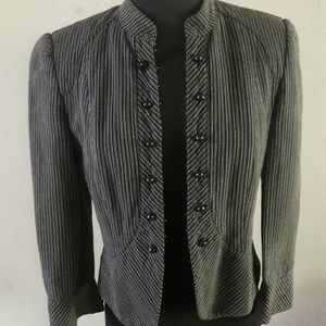 A stylish  black and tan jacket.