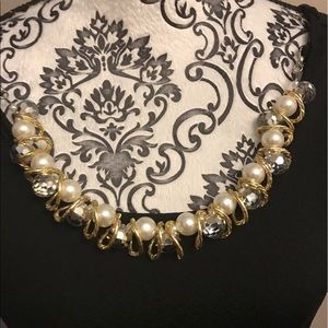 Sleeveless top with necklace