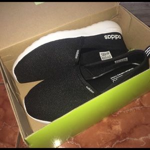 Black and White Cloudfoam slip on's.