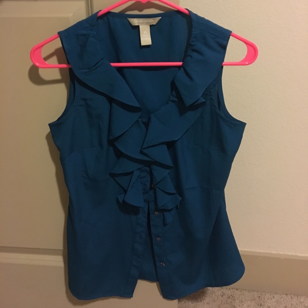 ruffled sleeveless blouse