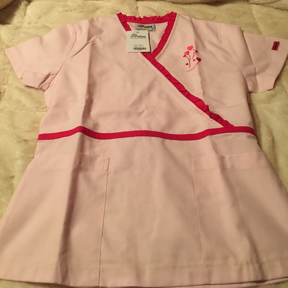 Beautiful pair of scrubs with a tag.