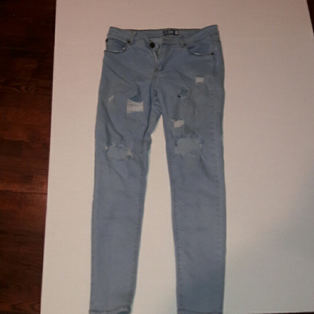 Distressed light wash jeans