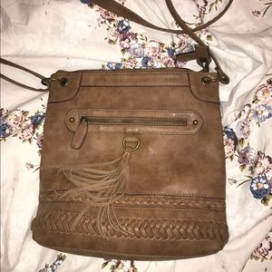 Super cute brown fringe purse