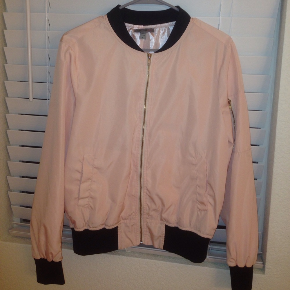 A pink thin bomber jacket