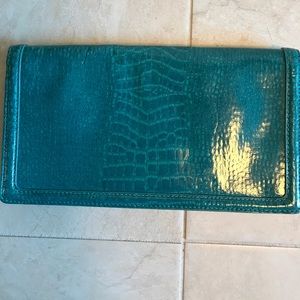 Beautiful leather turquoise clutch