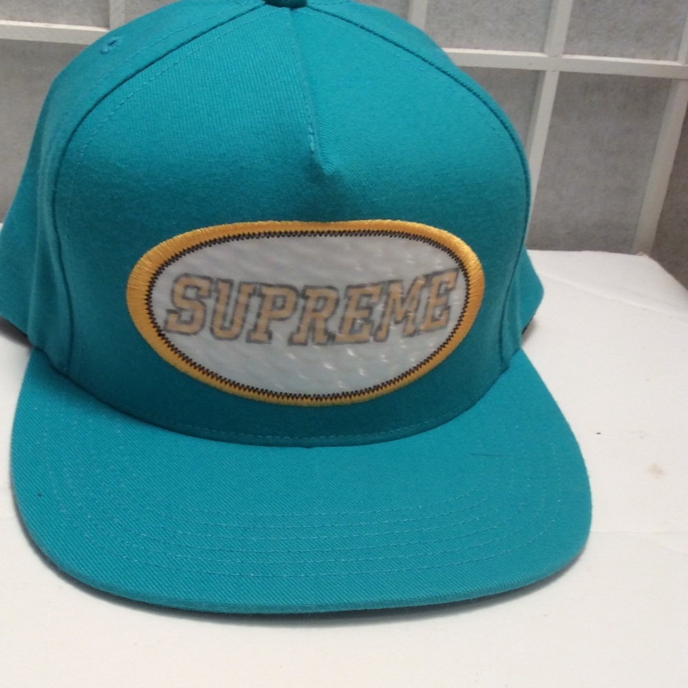 NWT Supreme tel color hat