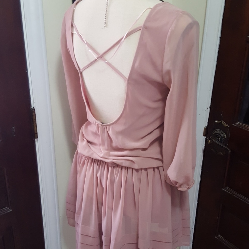 Adorable low cut back dress .Like New!