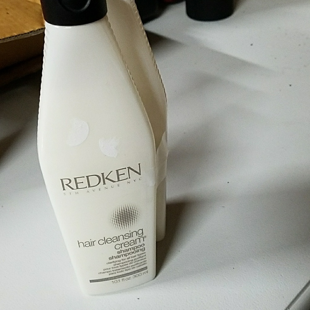 2 bottles of redken hair cleansing shampoo.