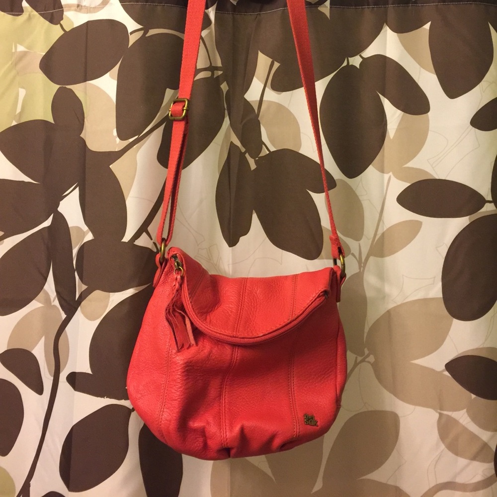 The Sak coral leather cross body