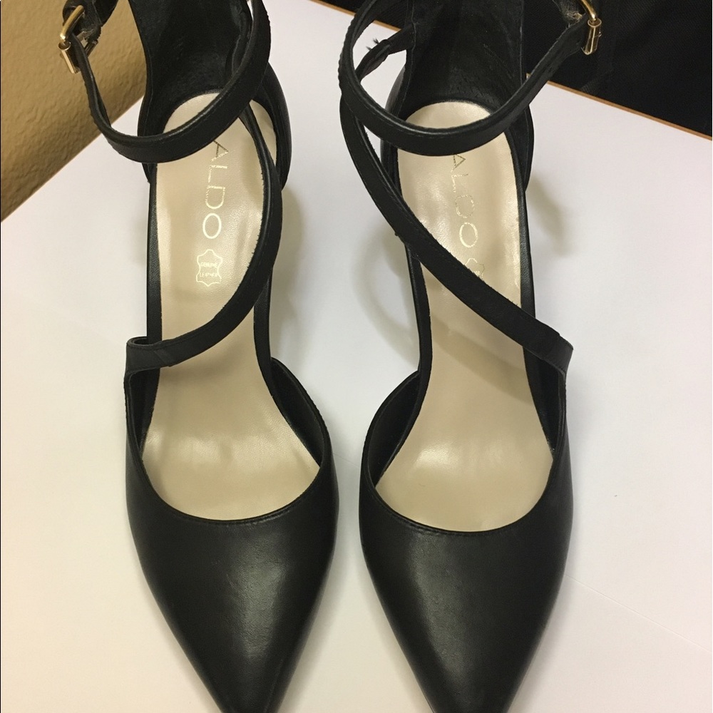 Black pointy, strappy, low with gold accent heels