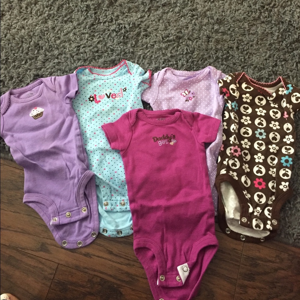 Assortment of baby girl onsies